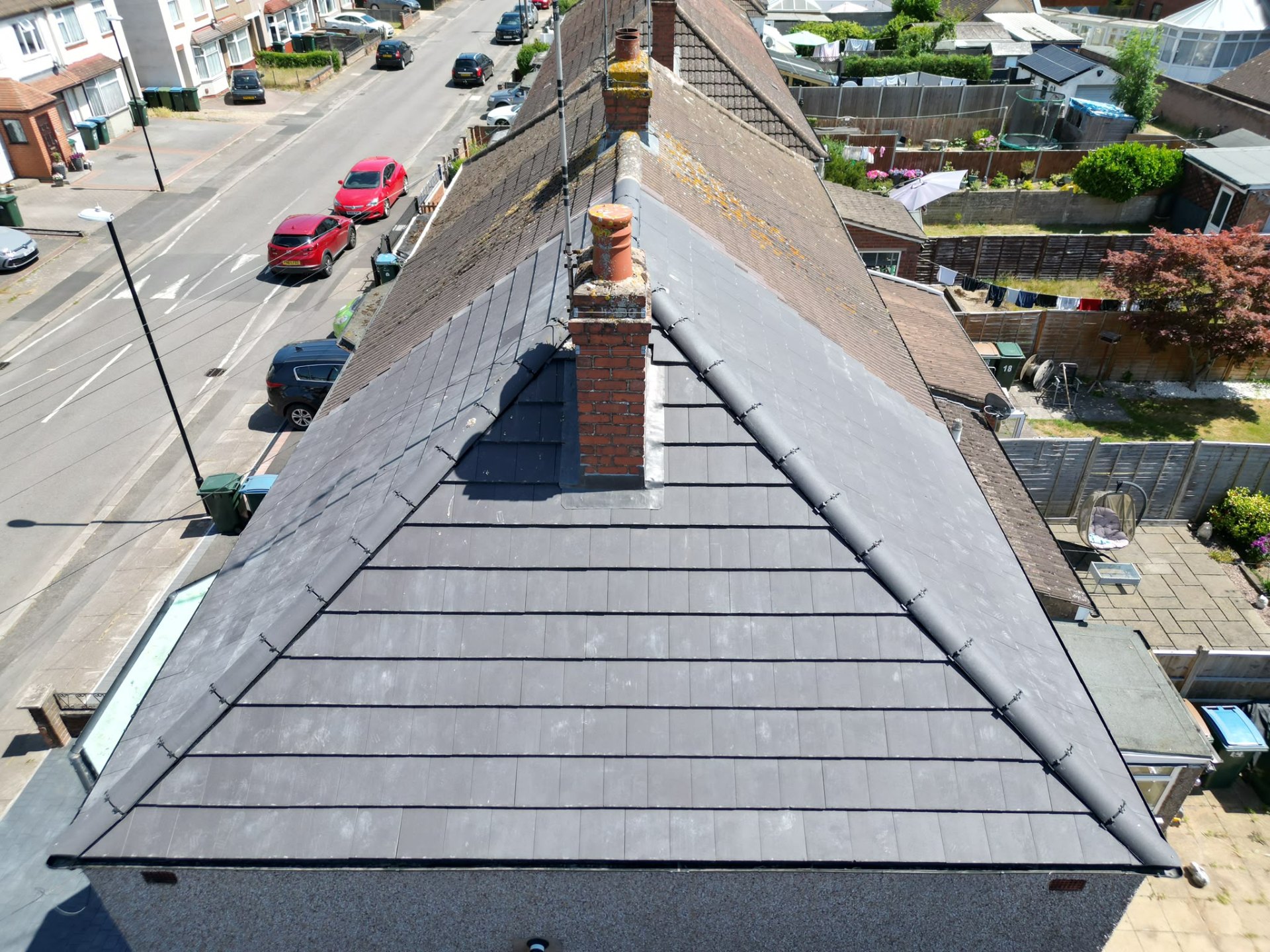 Full slate re-roof with new chimneys and hip ridge in Coventry